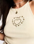 Фото #2 товара Miss Selfridge festival backless cami crop top with stud heart detail in cream