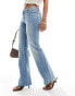 Фото #1 товара Monki Wakumi low waisted boot cut jeans in light blue wash