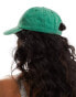 ASOS DESIGN washed slogan cap in green