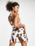 Фото #3 товара ASOS DESIGN halter mini dress with ra ra skirt in cow print