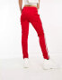 adidas Originals SST track pants in red