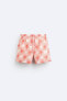 Regular-fit floral print swimming trunks