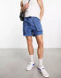 ASOS DESIGN pull on mid length denim shorts with cargo pockets in mid wash blue