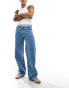 Фото #4 товара Calvin Klein Jeans 90s loose jeans in mid wash