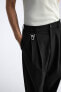 WIDE-FIT PLEATED TROUSERS