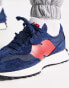 New Balance 327 trainers in navy and red