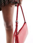 ASOS DESIGN asymmetric buckle shoulder bag in red