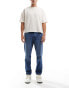 Фото #1 товара ONLY & SONS Yoke tapered fit jeans in mid blue wash