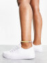 Фото #2 товара ASOS DESIGN Wide Fit Dizzy lace up trainers in white