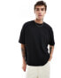 ASOS DESIGN oversized t-shirt with waffle texture and roll sleeve in black