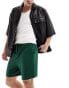 Фото #1 товара ASOS DESIGN slim waffle shorts in dark green