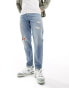 ASOS DESIGN tapered fit jeans with rips in light wash blue - MBLUE