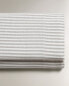 Flat sheet with thin stripes