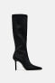 Stretch high-heel boots with square toe
