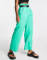 Vero Moda high waisted belted trousers in bright green