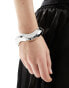 Фото #1 товара ASOS DESIGN bangle bracelet with wave detail in silver tone