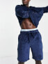 ASOS DESIGN pyjama set in navy ribbed velour with polo long sleeve top and shorts