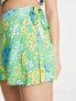 Фото #4 товара ASOS DESIGN wrap tie skort in green meadow floral print