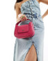 DKNY Arden top handle bag with cross body strap in pink croc