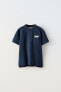 Piqué polo shirt with pocket