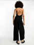 Фото #4 товара ASOS DESIGN crinkle jersey halter jumpsuit in black