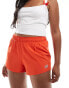 New Balance Rc short 3" in orange