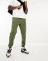 ASOS DESIGN tapered fleece joggers in green