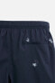 REGULAR SWIMMING TRUNKS WITH EMBROIDERY