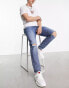 HUGO 634 distressed knees tapered fit jeans in mid blue