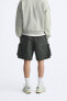 Faded cargo bermuda shorts