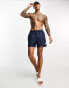 Фото #8 товара River Island shorter length swim shorts in navy