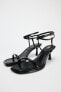 Leather high-heel sandals with tubular strap