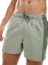 ASOS DESIGN swim shorts in short length with tonal panel design in khaki