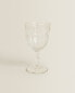 Raised design wine glass