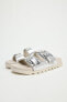 Buckled flat slider sandals