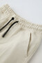 Piqué trousers with seam detail