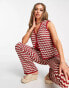 Damson Madder crochet sleeveless cardigan in red and white check