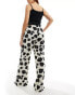 Vero Moda Aware wide leg trousers in monochrome floral print