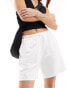 Фото #1 товара Weekday Ada track shorts with pull-on elasticated waistband in white