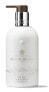 Фото #1 товара Лосьон для тела увлажняющий Molton Brown MILK MUSK 300 мл