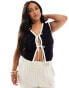 Фото #1 товара ASOS DESIGN Curve knitted waistcoat with contrast tipping in black and cream