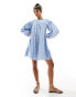 Фото #1 товара ASOS DESIGN extreme gathered smock mini dress with exaggerated sleeve and bow back in blue