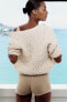 Woven knit cardigan with short sleeves