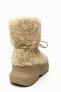 Flat faux shearling ankle boots