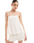 & Other Stories co-ord strappy raw hem cut out back top in white textured jacquard