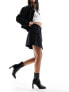 Morgan aline mini skirt with hardwear detail in black