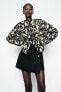 SNAKESKIN PRINT PUFFER JACKET