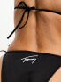Tommy Jeans signature cheeky string tie side bikini bottom in black
