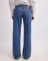 NA-KD low waist straight leg jeans in mid blue