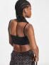 Motel cut out strap detail cami crop top in black